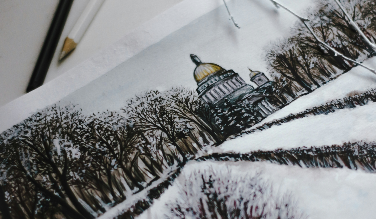 Drawing of winter scene of building with gold and trees